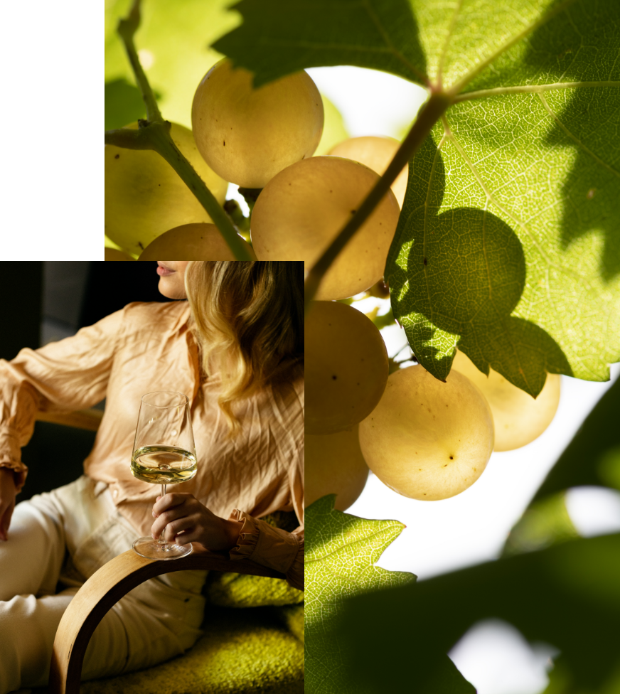 donna con calice e chicchi d'uva sullo sfondo